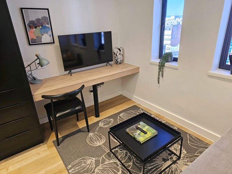 The desk and television at The Carrington