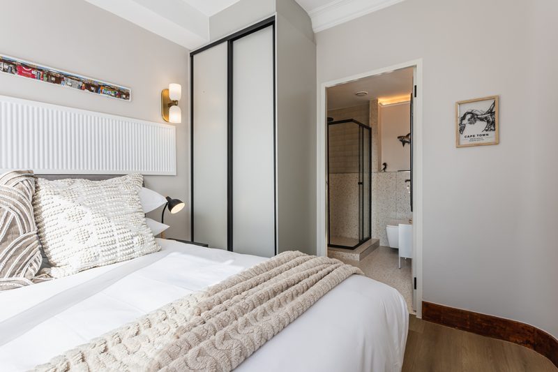 The bed at Charlie and the Chairman, looking towards the bathroom