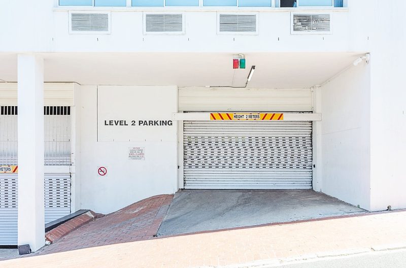The garage entrance at 220 Loop Street, signed at two metres